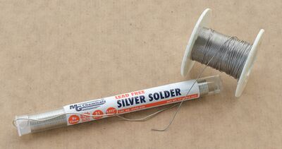 Solder on a roll, and in a dispenser.